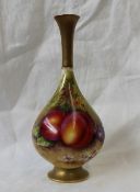 A Royal Worcester porcelain baluster vase painted with peaches and cherries to an ivory ground,