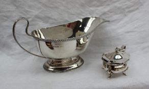 A George V silver sauce boat, with a gadrooned edge on a spreading foot, Birmingham,