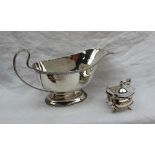 A George V silver sauce boat, with a gadrooned edge on a spreading foot, Birmingham,