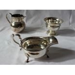 A George V silver sauce boat, with a gadrooned edge,