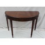 A 20th century mahogany 'D' shaped table,