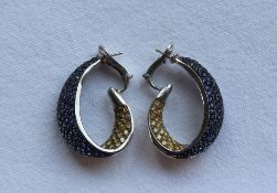 A pair of Sapphire hoop earrings,