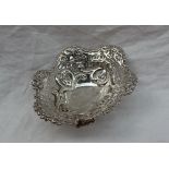 A late Victorian silver pedestal bon bon dish, with a leaf cast and pierced edge,