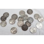 Three George III silver crowns dated 1821, together with sixteen Victorian silver crowns dated 1889,