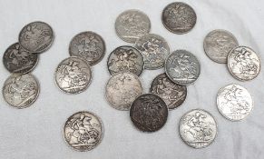 Three George III silver crowns dated 1821, together with sixteen Victorian silver crowns dated 1889,