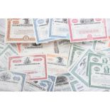 A collection of early 20th century share certificates including Tobacco Products Corporation,