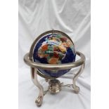 A gem set globe,