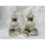 A pair of Elizabeth II silver mounted and iridescent bubble glass ball pyramid inkwells, London,