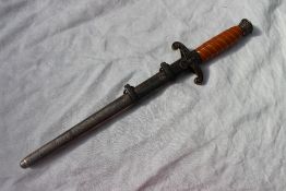 A World War II Third Reich Heer Officers Dagger, with an orange celluloid grip,