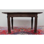 A 17th century oak side table,