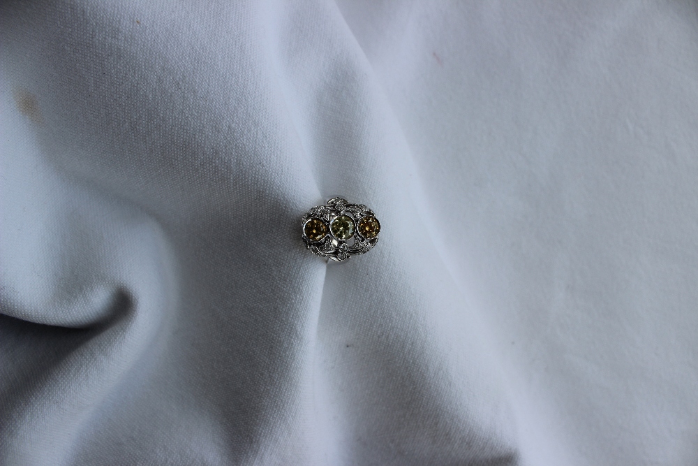 A diamond dress ring, set with three fancy yellow round brilliant cut diamonds, - Image 2 of 6