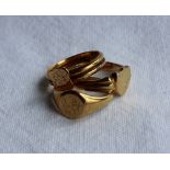 An 18ct yellow gold signet ring of shield shape, together with two other 18ct yellow gold rings,