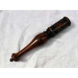 A George IV painted and turned truncheon, with a gilt crown, and initials,