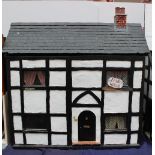 Dolls House - "Fair Holme" a tudor style house, with a slate roof and four rooms, bedroom, bathroom,