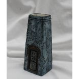 A Troika pottery coffin vase with a blue textured ground with geometric pattern decoration,