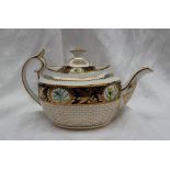 A 19th century porcelain teapot, the domed cover with an oval finial,