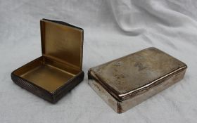 A continental silver tobacco box with reeded decoration and a gilt interior, marked 900,