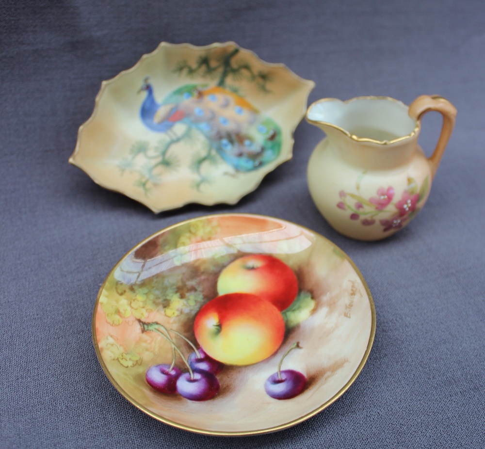 A Royal Worcester porcelain miniature jug, transfer and infil decorated with garden flowers,