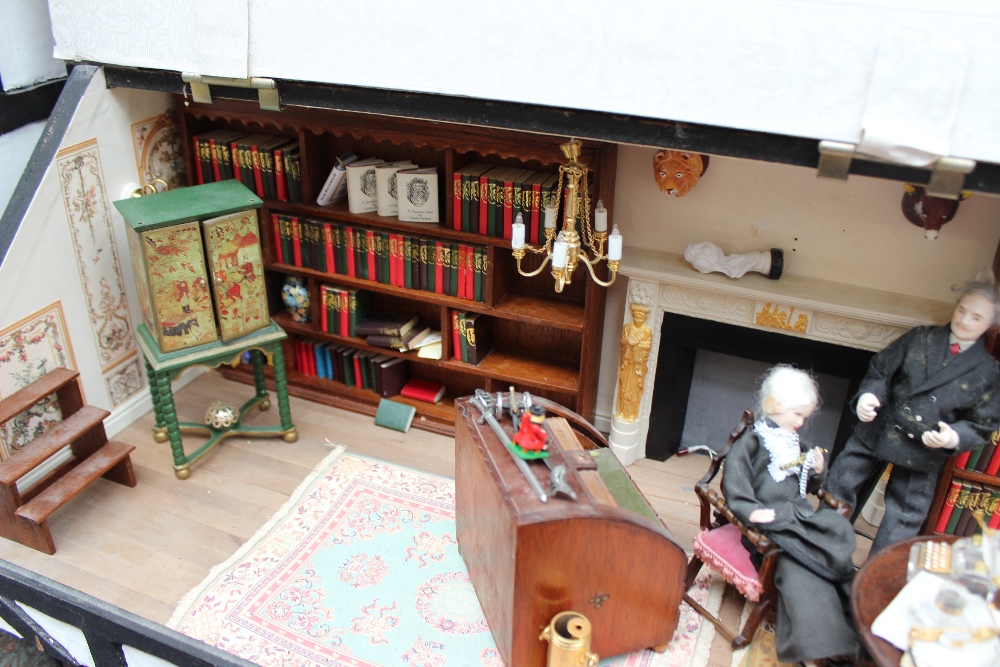 Dolls House - A long house, the hinged slate roof opening to reveal a library with bookcases, - Image 2 of 5