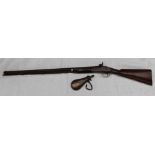 A 19th century percussion cap rifle, with a walnut stock and brass fitting, ramrod present,