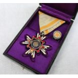 A Japanese military award "Order Of The Sacred Treasure",