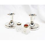 A pair of David Anderson white metal desk candlesticks, 7.