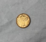 A Victorian gold Sovereign dated 1886