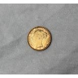 A Victorian gold Sovereign dated 1886