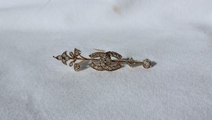 A diamond set brooch,