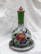 A 19th century Pompeii pottery bottle vase, cover and stand, decorated with flowers and leaves,