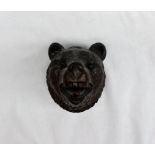 A Black Forest carved Bear's head wall mount, 14.