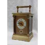 A 19th century French brass carriage clock, with corinthian columns,