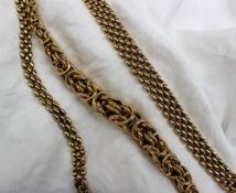 A 9ct yellow gold rope twist necklace 46cm long together with a 9ct gold three strand necklace and