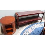 A two-tier buffet together with a reproduction mahogany cylindrical bookcase / occasional table