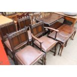 A 20th century oak gate leg dining table together with four dining chairs and a mahogany