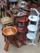 A mahogany occasional table together with a sewing machine, folding African table,