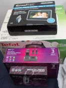 A collection of new and used boxed appliances including a Tefal Actifry together with cordless