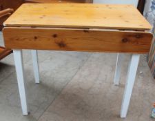 A painted pine kitchen table