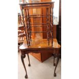 A reproduction walnut card table on leaf carved cabriole legs together with a nest of two rosewood