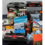 A collection of new and used boxed appliances including assorted tools,