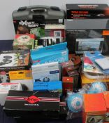 A collection of new and used boxed appliances including assorted tools,