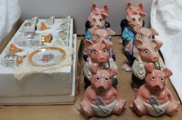 Two sets of five Natwest piggies,