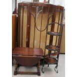 A 20th century walnut display cabinet together with a small oak drop leaf table and a folding cake