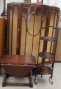 A 20th century walnut display cabinet together with a small oak drop leaf table and a folding cake