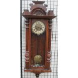 A walnut cased Vienna regulator type wall clock together with a 19th century mahogany mantle clock