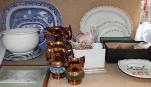 A collection of copper lustre jugs together with blue and white meat plates, part tea set,