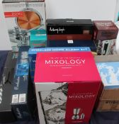 A collection of new and used boxed appliances including saucepan sets together with wine opener,