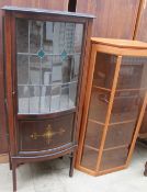 An Edwardian mahogany display cabinet together with a teak display cabinet