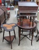 An Anglo Indian carved trefoil table together with a circular occasional table,