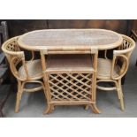 A bamboo conservatory table and two chairs